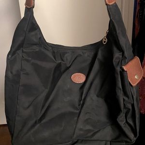 Black Longchamp over the shoulder bag